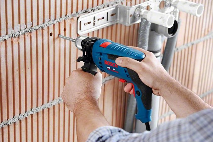 Bộ dụng cụ Máy khoan Bosch GSB 1300 RE Set